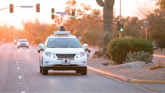 A Google Waymo self-driving Lexus on the road in Arizona