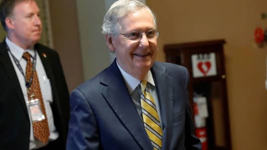 Senate Majority Leader Mitch McConnell walks to his office from the Senate floor on Capitol Hill in Washington, July 13, 2017.
