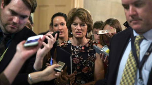 U.S. Sen. Lisa Murkowski (R-AK)) is surround by members of the media as he is on his way to view the details of a new health care bill July 13, 2017 at the Capitol in Washington, DC.