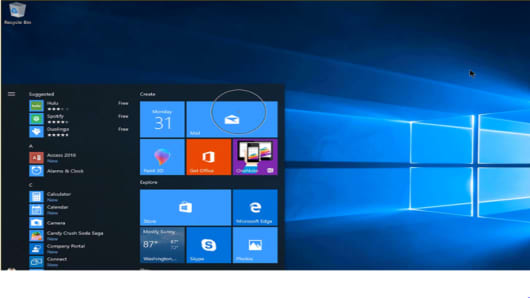 The image shows the Microsoft Windows 10 Eye Control feature being used to control the mouse.