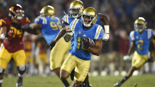 UCLA (10) Fabian Moreau (DB) intercepts a pass and runs the ball during an NCAA football game between the USC Trojans and the UCLA Bruins on November 19, 2016, at the Rose Bowl in Pasadena, CA.