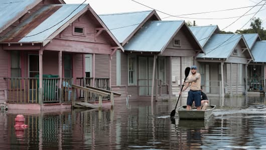Marine veterans Rocky Damico with the Wounded Veterans of Oklahoma searches for residents in need of help after torrential rains pounded Southeast Texas following Hurricane and Tropical Storm Harvey causing widespread flooding on September 2, 2017 in Orange, Texas.
