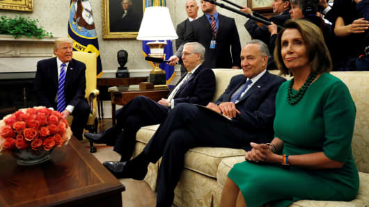 President Donald Trump meets with Senate Majority Leader Mitch McConnell (L), U.S. Senate Democratic Leader Chuck Schumer (2nd R), House Minority Leader Nancy Pelosi (R) and other congressional leaders in the Oval Office of the White House in Washington, September 6, 2017.