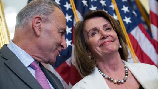 Senate Minority Leader Charles Schumer, D-N.Y., and House Minority Leader Nancy Pelosi, D-Calif., attend a news conference on September 14, 2017.