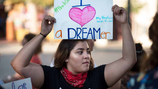 DACA supporter, Lauren Gonzales, protests the Trump administrations termination of the Deferred Action for Childhood Arrivals program.