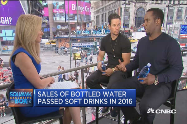 Sean Combs and Mark Wahlberg wade into water venture