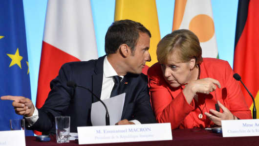 French President Emmanuel Macron and German Chancelor Angela Merkel during a press conference at Elysee Palace on August 28, 2017 in Paris, France.