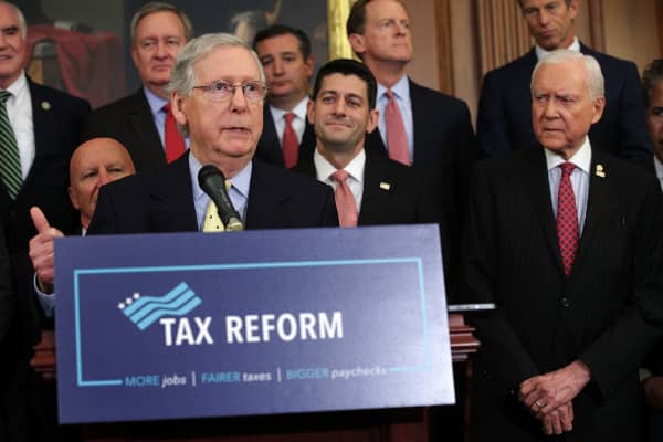 Image result for photos of us congress working on tax cut bills