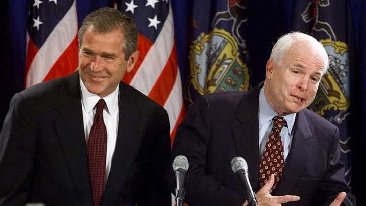 Republican presidential candidate Texas Gov. George W. Bush (L) and vanquished contender Sen. John McCain (R-AZ) joke as they answer questions from the media during a press conference in Pittsburgh May 9. McCain endorsed his former political rival Texas Gov. Bush as the Republican U.S. presidential nominee, but said he would not be Bush's running-mate.