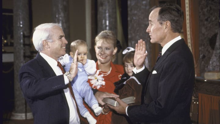 Vice President George H.W. Bush (R), re-enacting Senate Swear- In with Sen. John S. McCain and his family.