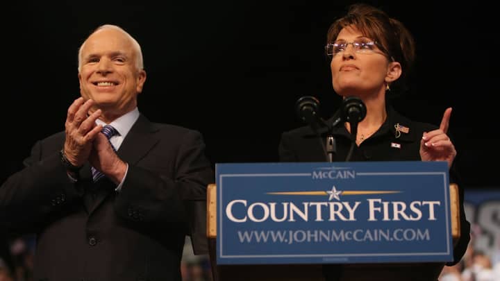 Alaska Gov. Sarah Palin speaks as presumptive Republican presidential nominee John McCain looks on at a campaign rally August 29, 2008 in Dayton, Ohio. McCain announced Palin as his vice presidential running mate at the rally.
