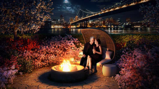 One of the many outdoor amenities at One Manhattan Square is a fire pit