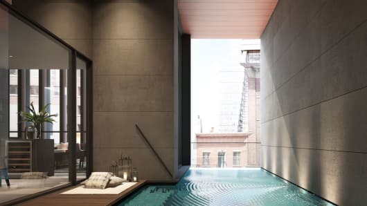 A four foot deep salt water pool off of the living room at the Soori High Line