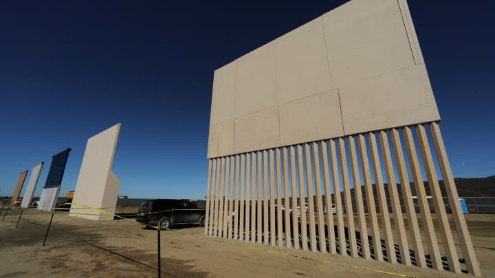 Five of U.S. President Donald Trump's eight border wall prototypes are shown near completion along U.S.- Mexico border near San Diego, California, U.S., October 23, 2017.