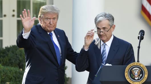 President Donald Trump signals the end of ceremony after announcing Jerome Powell as nominee for Chairman of the Federal Reserve in the Rose Garden of the White House in Washington, DC, November 2, 2017.