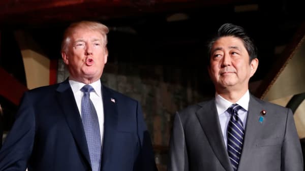 U.S. President Donald Trump and Japanese Prime Minister Shinzo Abe meet at a restaurant in Tokyo on Nov. 5, 2017.