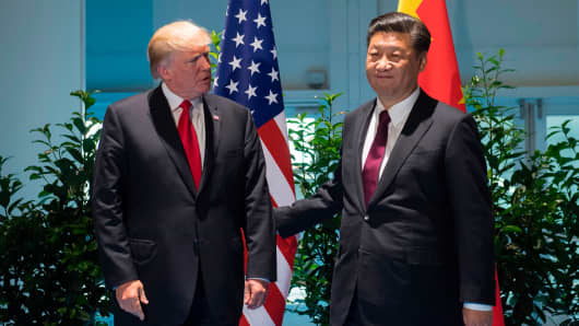President Donald Trump and Chinese President Xi Jinping (R) at the G-20 Summit in Hamburg, Germany, July 8, 2017.