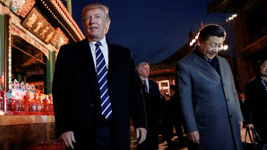 President Donald Trump and China's President Xi Jinping leave after an opera performance at the Forbidden City in Beijing, China, November 8, 2017.