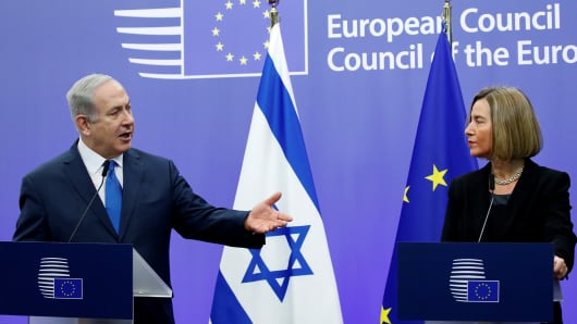Israel's Prime Minister Benjamin Netanyahu and European Union foreign policy chief Federica Mogherini brief the media at the European Council in Brussels, Belgium December 11, 2017.