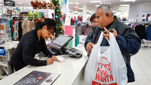 A shopper makes a purchase at the J.C. Penney department store in North Riverside, Illinois.