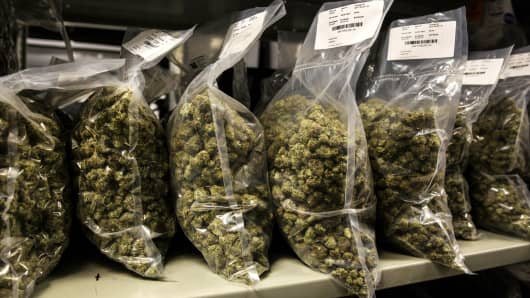 Packages of marijuana are seen on shelf before shipment at the Canopy Growth Corp.