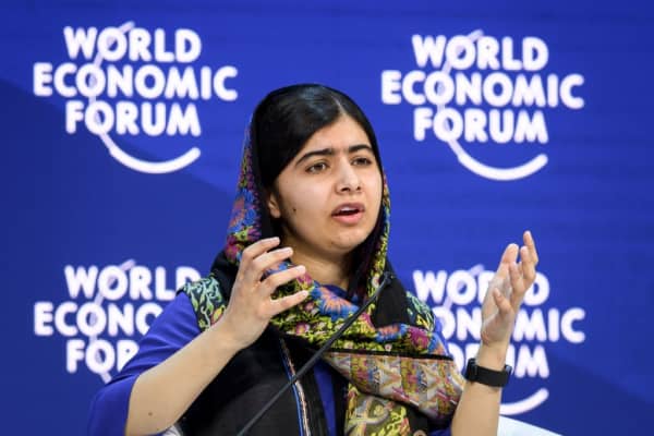 Pakistani Nobel Peace Prize Malala Yousafzai gestures while talking during a session at the Economic Forum (WEF) annual meeting on January 25, 2018 in Davos, eastern Switzerland