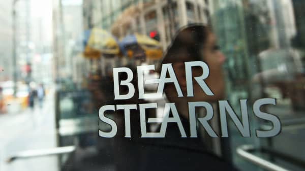 A woman enters Bear Stearns headquarters in New York, March 14, 2008.