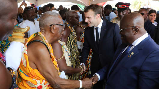 French President Emmanuel Macron (2nd R) and Ghanaian President Nana Akufo-Addo in Accra, Ghana, on November 30, 2017.