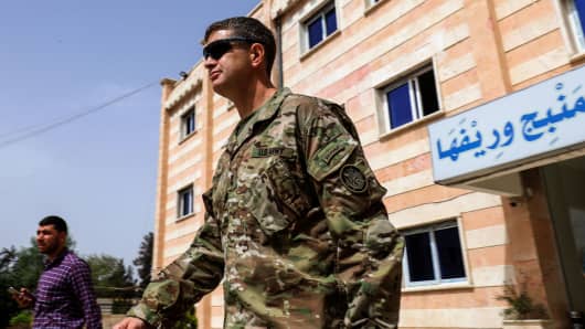 U.S. Army Maj. Gen. James B. Jarrard leaves following a meeting in the YPG-held northern Syrian city of Manbij, where the US has a military presence, on March 22, 2018.