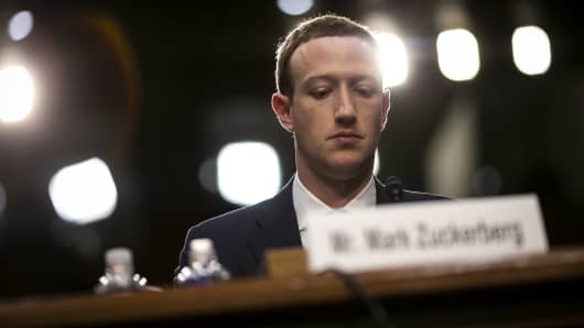 Mark Zuckerberg, chief executive officer and founder of Facebook Inc., listens during a joint hearing of the Senate Judiciary and Commerce Committees in Washington, D.C., U.S., on Tuesday, April 10, 2018.