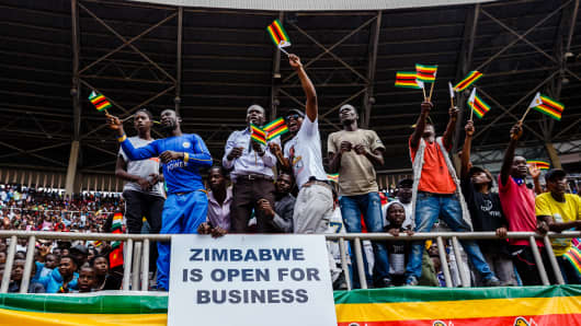 People celebrate Zimbabwe Independence Day at the National Sports Stadium on April 18, 2018, in Harare.