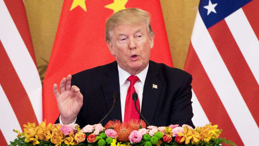 President Donald Trump speaks during a press conference with China's President Xi Jinping at the Great Hall of the People in Beijing on November 9, 2017.