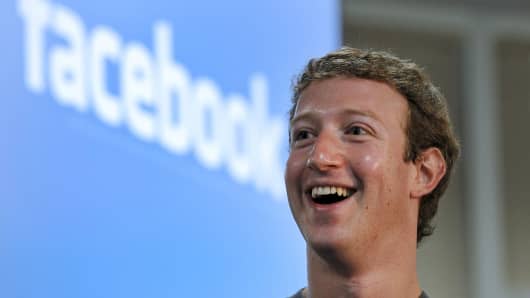 Mark Zuckerberg, founder and chief executive officer of Facebook Inc., smiles during a news conference at the company's headquarters in Palo Alto, California, U.S., on Wednesday, Oct. 6, 2010.