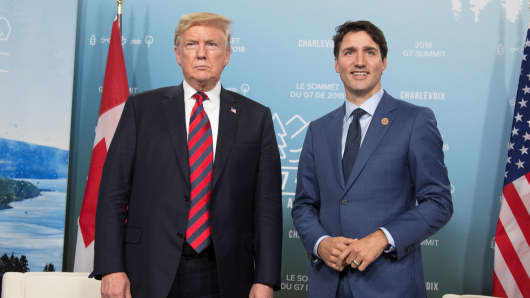 Canada's Prime Minister Justin Trudeau (R) meets with U.S. President Donald Trump during the G7 Summit in the Charlevoix town of La Malbaie, Quebec, Canada, June 8, 2018.