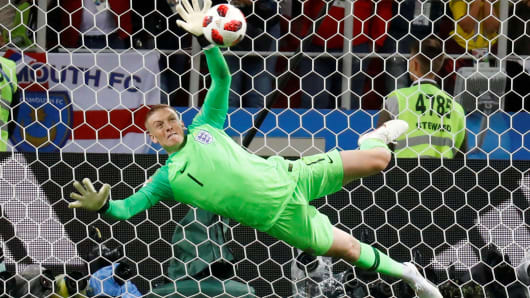 England's Jordan Pickford saves a penalty during the shootout from Colombia's Carlos Bacca.