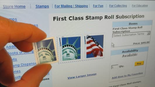 A 44-cent first class American stamp is placed against a screen on April 15, 2011 in Washington, DC. The US Post had the egg on his face Friday after realizing that a stamp closely representing the Statue of Liberty was not taken in the port of New York, but in Las Vegas.