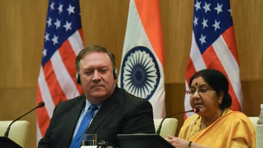 US Secretary of State Mike Pompeo (L) looks on as the Indian Foreign Minister Sushma Swaraj (R) present statements to the media following a meeting in New Delhi on September 6, 2018. Indraneel Chowdhury | NurPhoto | Getty Images