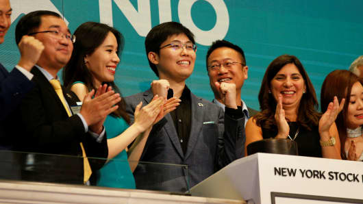 Chinese electric vehicle start-up Nio Inc's first employee Tianshu LI, and company's leadership team celebrate at the New York Stock Exchange (NYSE) Opening Bell to commemorate the company's initial public offering (IPO) at the NYSE in New York, September 12, 2018.Â 