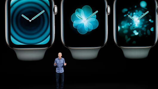 Jeff Williams, Apple's chief operating officer, speaks about the Apple Watch Series 4 at the Steve Jobs Theater during an event to announce new Apple products Wednesday, Sept. 12, 2018, in Cupertino, Calif.