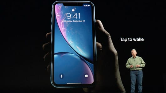 Philip W. Schiller, Senior Vice President, Worldwide Marketing of Apple, speaks about the the new Apple iPhone XR at an Apple Inc product launch event at the Steve Jobs Theater in Cupertino, California, September 12, 2018.