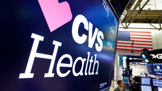 The CVS Health logo appears above a trading post on the floor of the New York Stock Exchange.