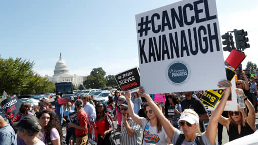 Activists hold a protest march and rally in opposition to U.S. Supreme Court nominee Brett Kavanaugh near the U.S. Capitol in Washington, October 4, 2018. 