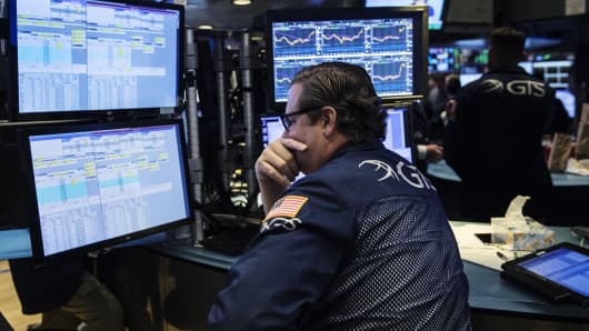 A trader works on the floor of the New York Stock Exchange (NYSE) in New York, United States,
