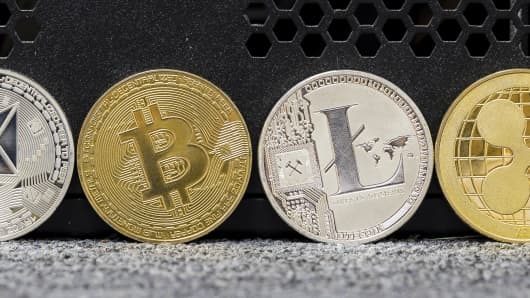 A photo illustration of the digital Cryptocurrency, Litecoin (LTC), Monero (XMR), Bitcoin (BTC), Ethereum (ETH), Ripple (XRP) and Dash are seen on September 13 2018 in Hong Kong, Hong Kong.