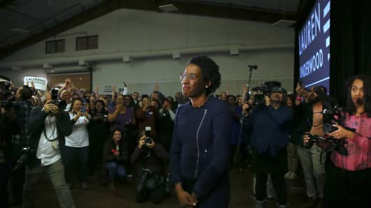 Lauren Underwood, Democratic Congresswoman-elect of the 14th Congressional District, pauses before stepping on stage to give her victory speech at her Election Night party at the Kane County Fairgrounds on Tuesday, Nov. 6,  2018, in St. Charles, Ill.