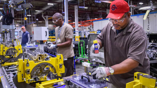 General Motors workers on the engine line at the General Motors Spring Hill Manufacturing plant in Spring Hill, TN. (Photo by Sanford Myers for General Motors)
