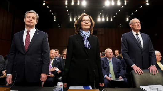 FBI Director Christopher Wray; CIA Director Gina Haspel and Director of National Intelligence Dan Coats arrive with other U.S. intelligence community officials to testify before a Senate Intelligence Committee hearing on "worldwide threats" on Capitol Hill in Washington, U.S., January 29, 2019.