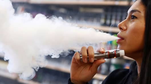   Patthasorn Kleespies of German e-cigarette manufacturer Eazzi tests a new vaping cigarette at Eazzi headquarters in Gelnhausen, Germany, January 29, 2019. 