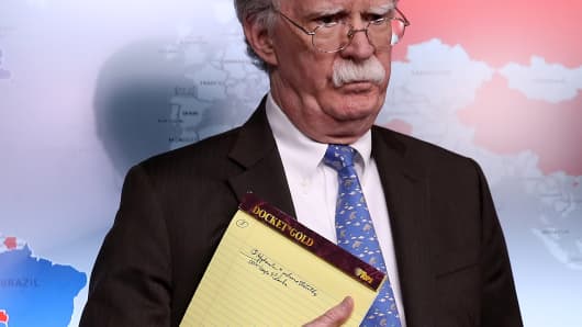 National Security Advisor John Bolton with that notebook as he listens to questions from reporters during a press briefing at the White House January 28, 2019 in Washington, DC. During the briefing, economic sanctions against Venezuela's state owned oil company were announced in an effort to force Venezuelan President Maduro to step down.