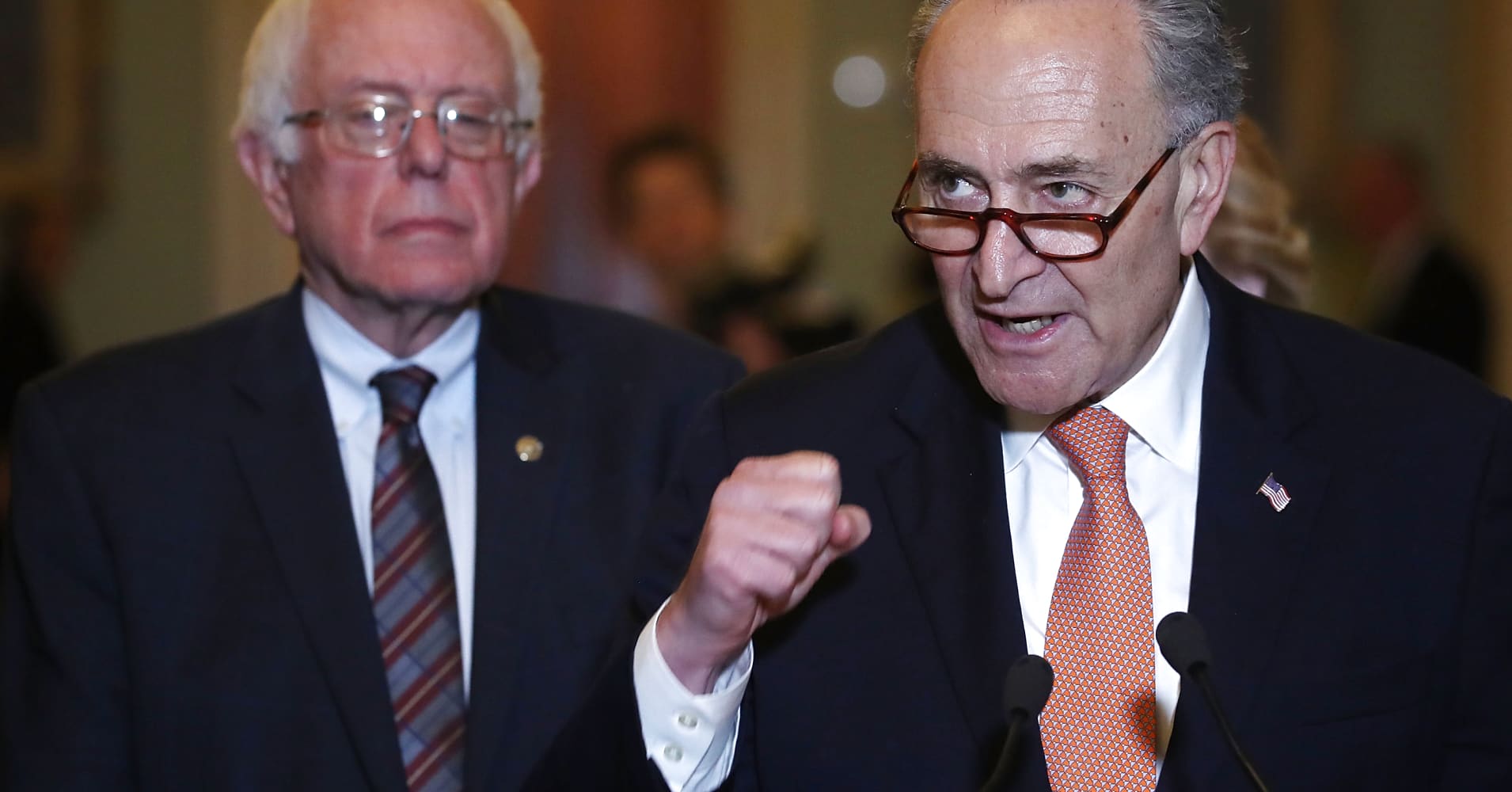 Chuck Schumer and Bernie Sanders call for restricting corporate share buybacks